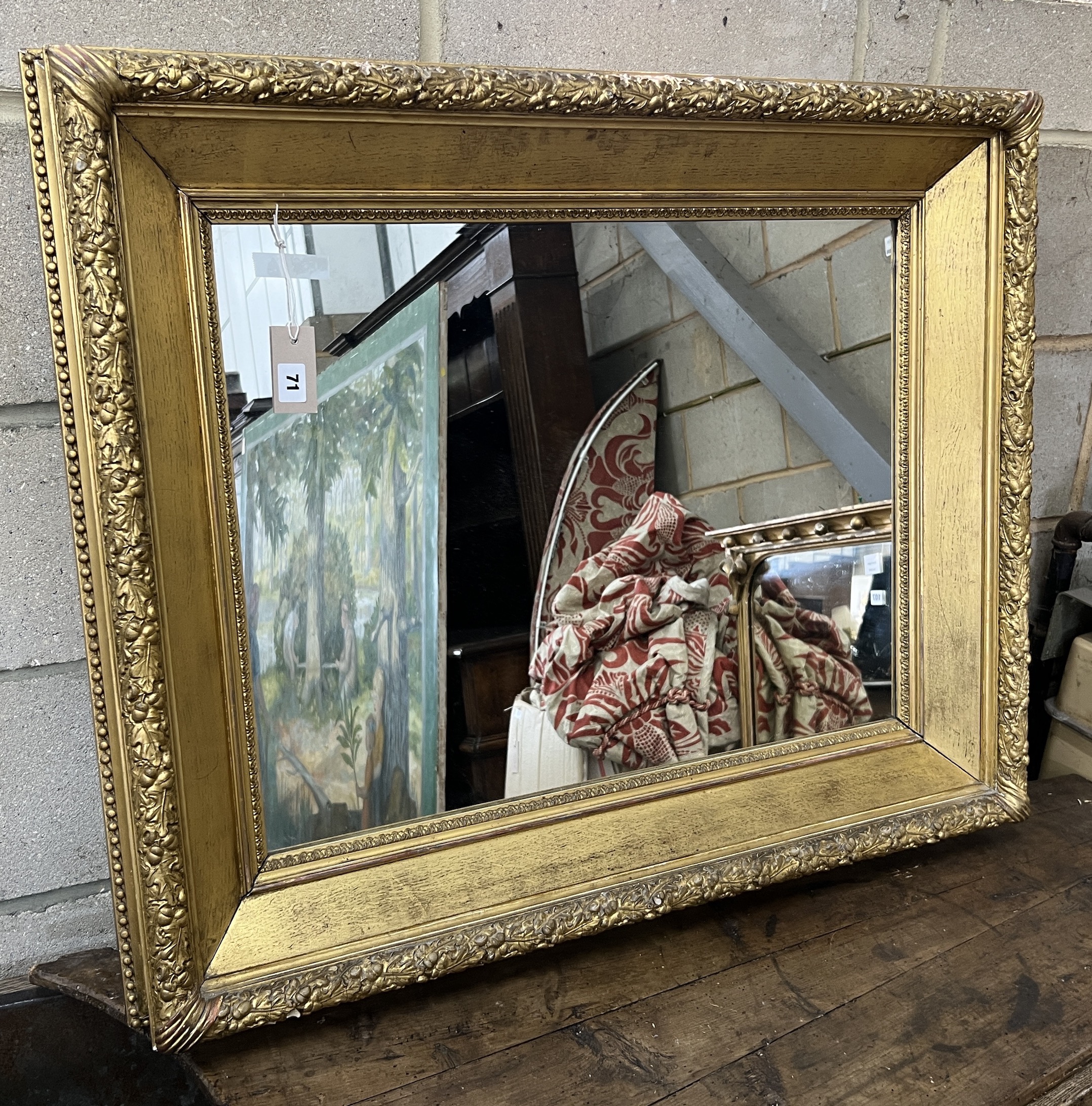 A Victorian rectangular giltwood and composition picture frame now as a wall mirror, width 93cm, height 77cm